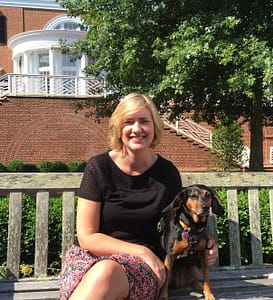 Sara with her dog, Dora, on the Darden campus this morning